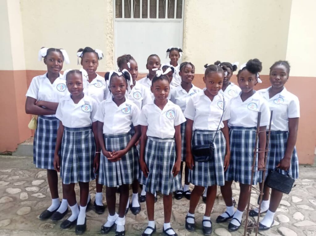 Girls in uniform at the Centre d’Études Jeff Cherubin Domond